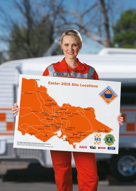 SES person holding a Map of victoria 