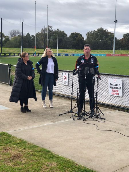 TAC's Samantha Cockfield and St Kilda AFL coach Brett Ratten shown at Moorabbin oval to launch Band Together, the TAC and AFL Victoria Road Safety Round 