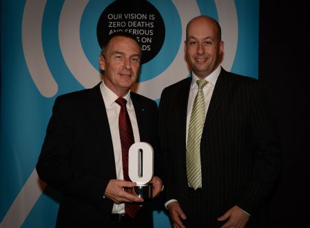 A representative from Robert Bosch Australia accepts the Safe Vehicles award