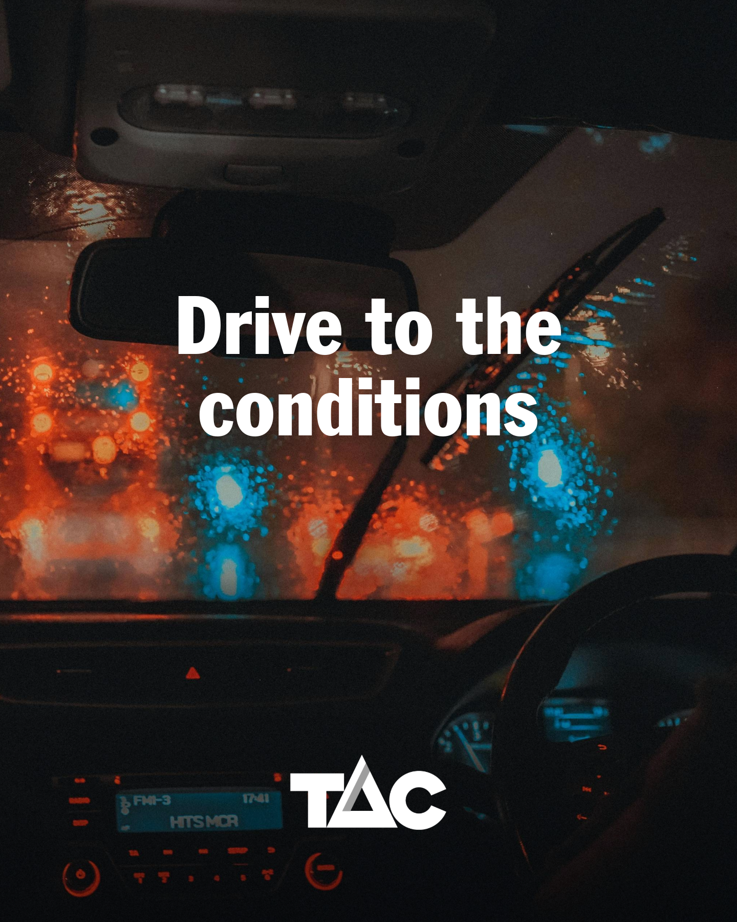 Drive to the conditions - view from inside a car through a rain drenched windshield