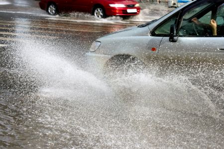 Car driving through water 