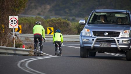 Bikes and cars on the same road 