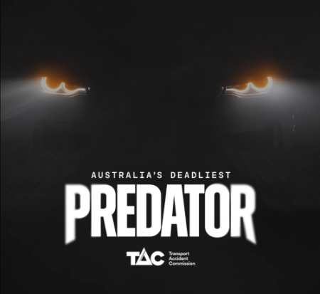 A black background with two yellow eyes looking like an animal and car lights. Wording is Australia's Deadliest Predator. TAC logo underneath. 
